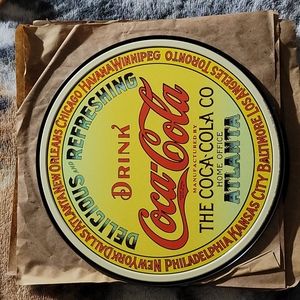 Coca cola round tin sign